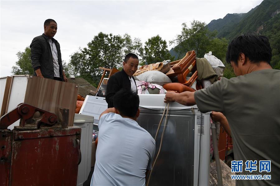 （新華全媒+）（9）千里“挪窩”，踏實(shí)開啟新生活