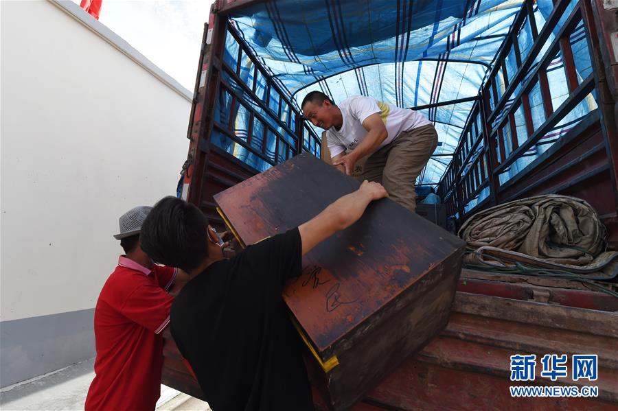 （新華全媒+）（26）千里“挪窩”，踏實(shí)開啟新生活